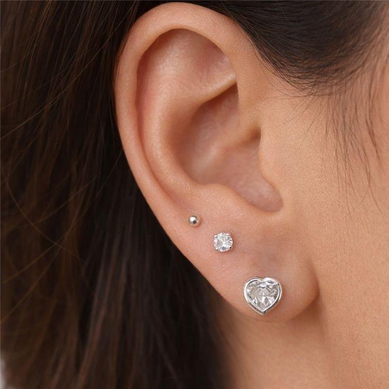 BRINCO TRIO CORAÇÃO CRISTAL, P. LUZ E BOLINHA PRATA 925