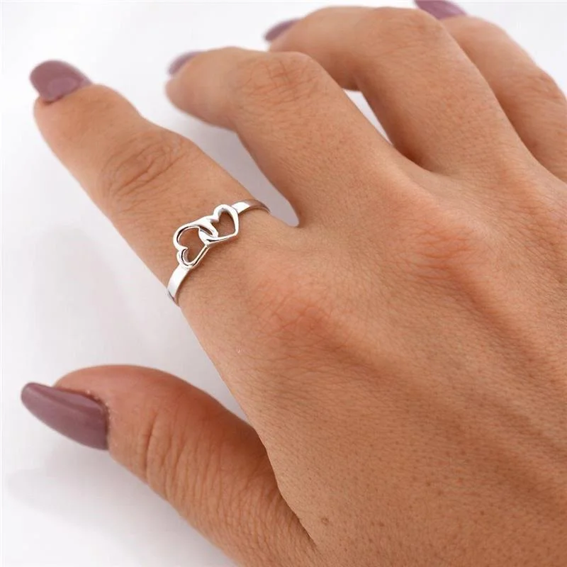 ANEL 2 CORAÇÕES VAZADOS PRATA 925