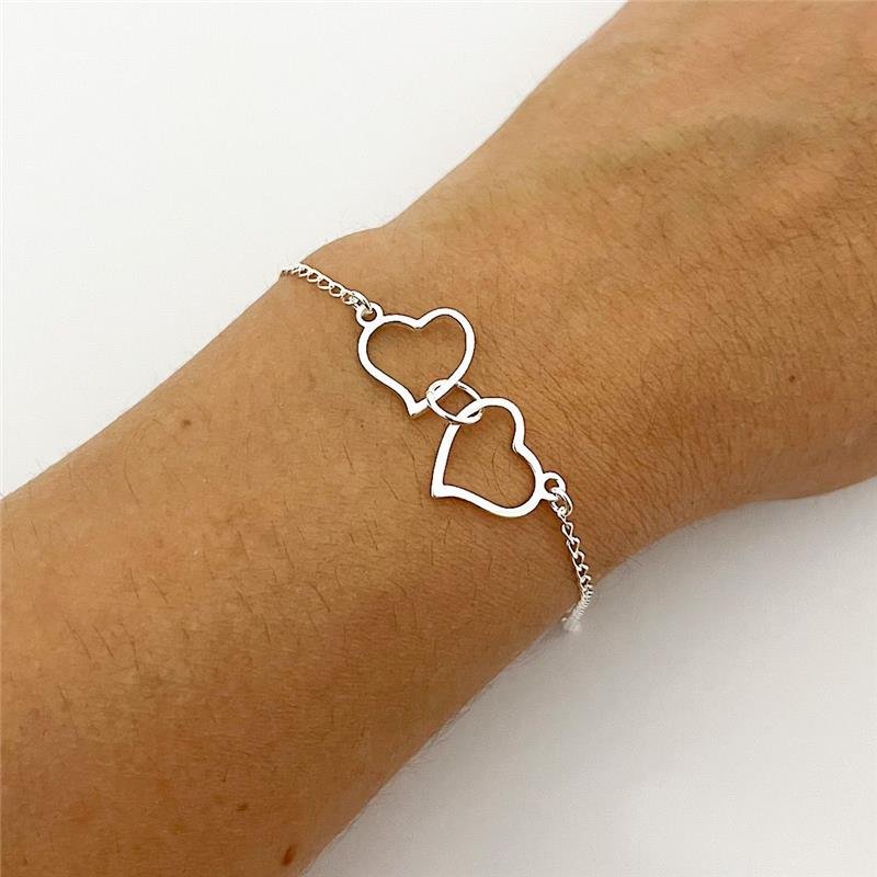 PULSEIRA VAZADA 2 CORAÇÕES PRATA 925