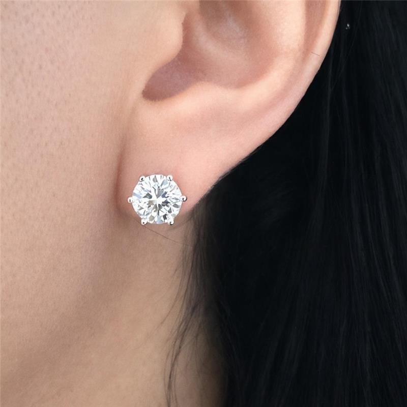 BRINCO MOISSANITE PONTO DE LUZ 6.5MM 6 GARRAS PRATA 925