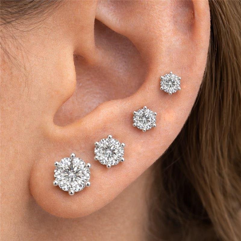 BRINCO MOISSANITE PONTO DE LUZ 7MM 6GARRAS PRATA 925
